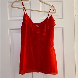 Red blouse with cute ruffles in the front size M